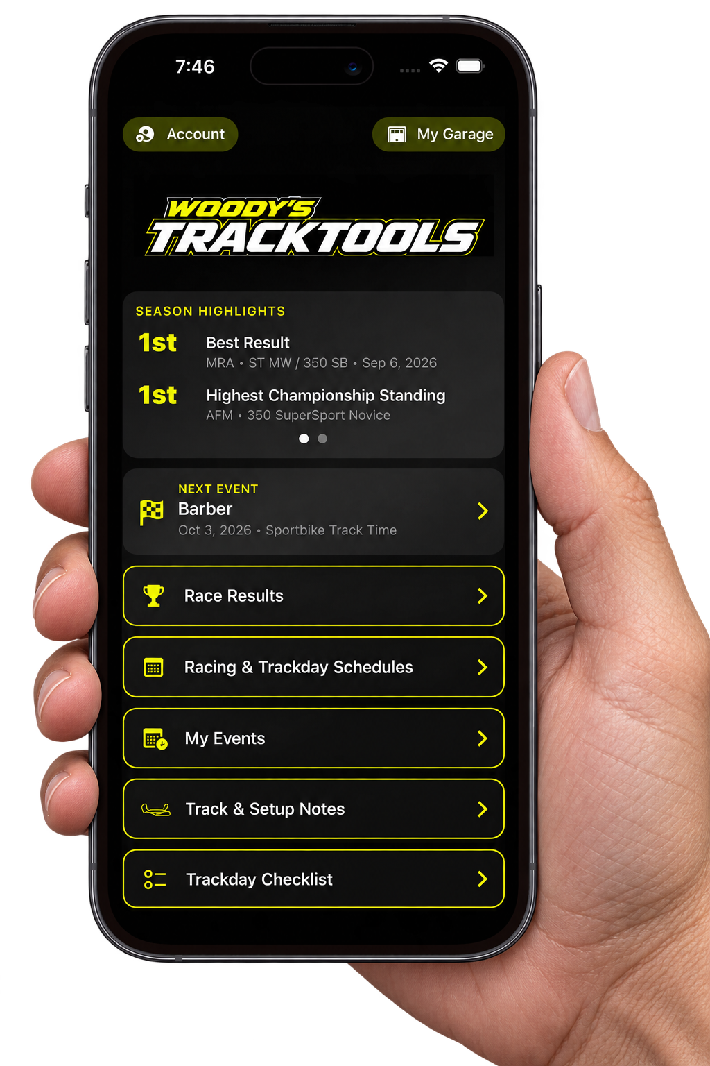 Hand holding an iPhone displaying the TrackTools app